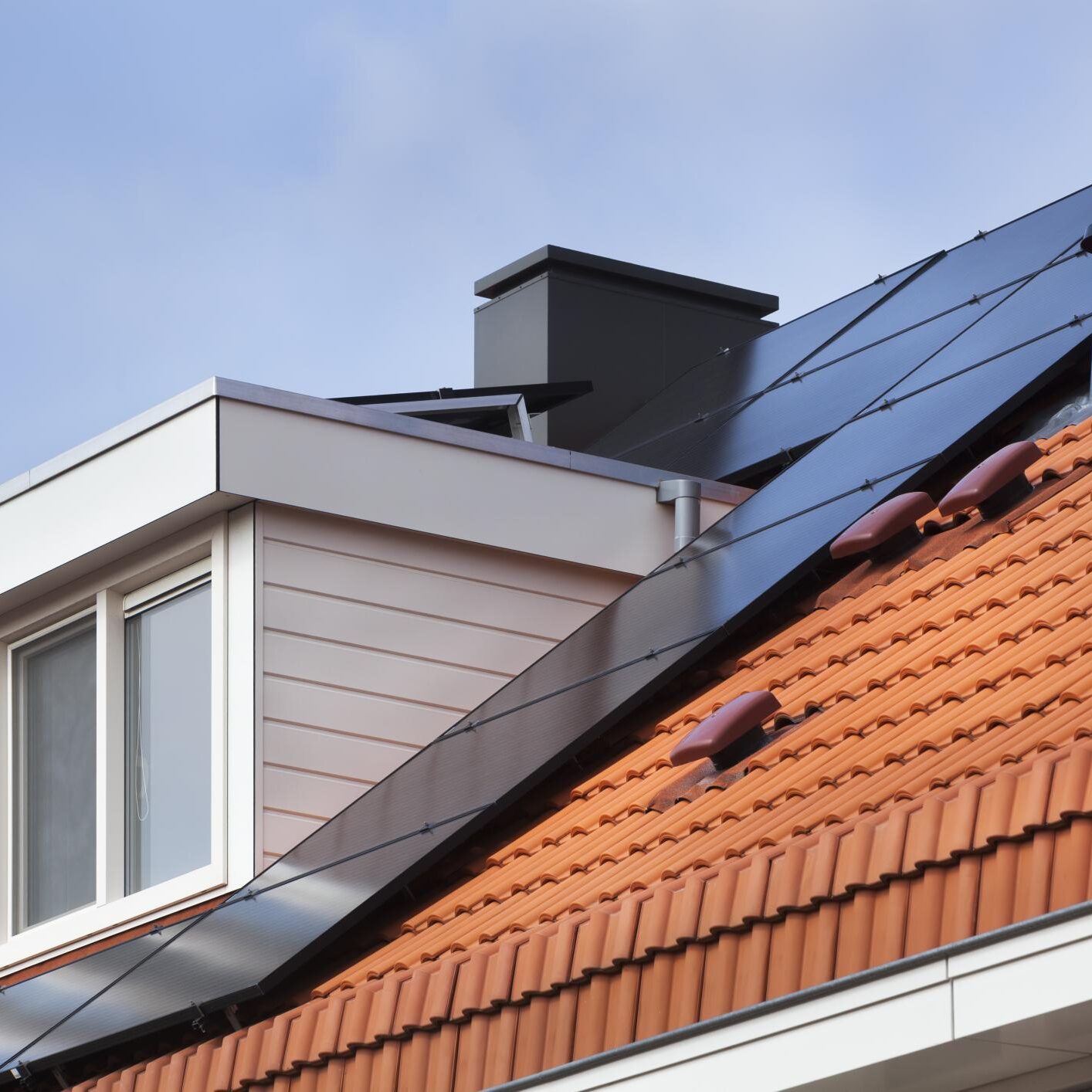 the roof of a house with a solar panel on it